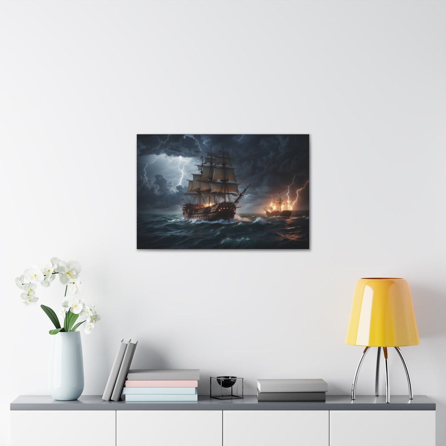 A canvas-wrapped print of a vintage tall ship at sea in battle during a storm. 