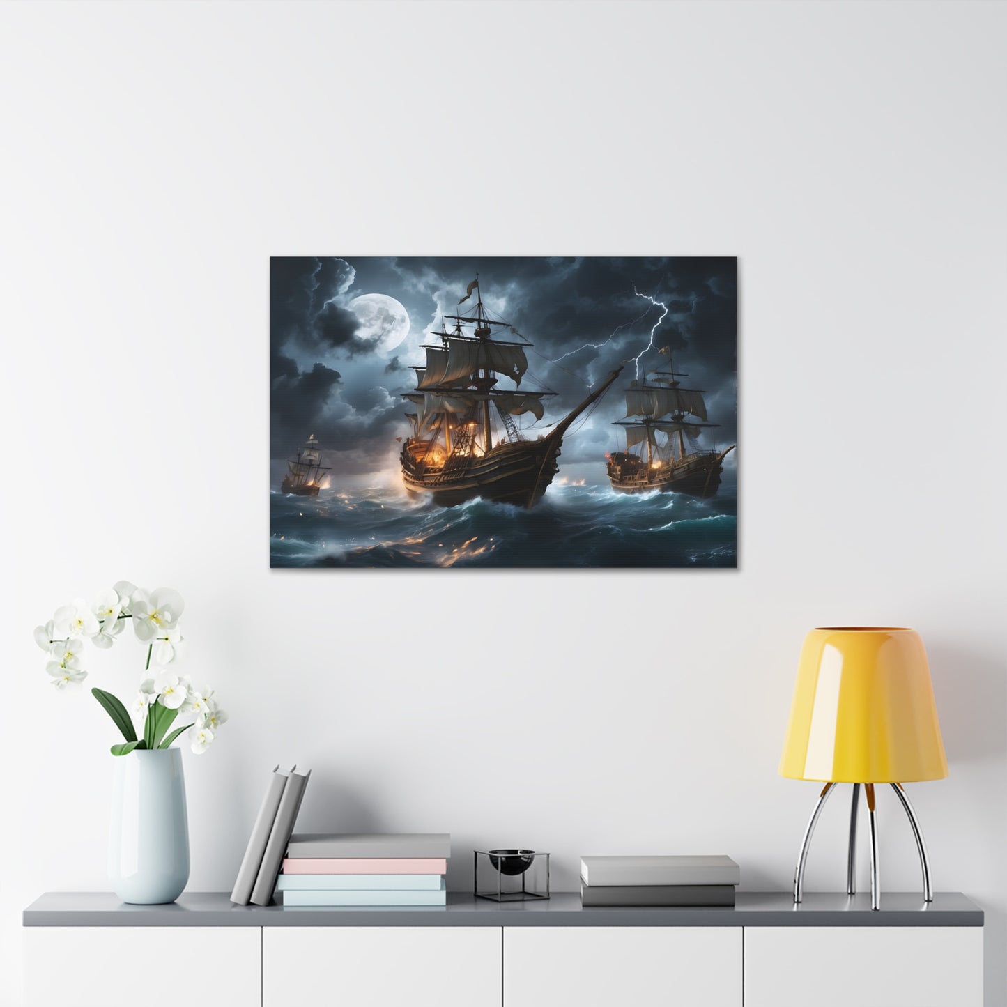 A canvas wrapped print  with the image of vintage tall ships in a battle at sea during a intense storm. 